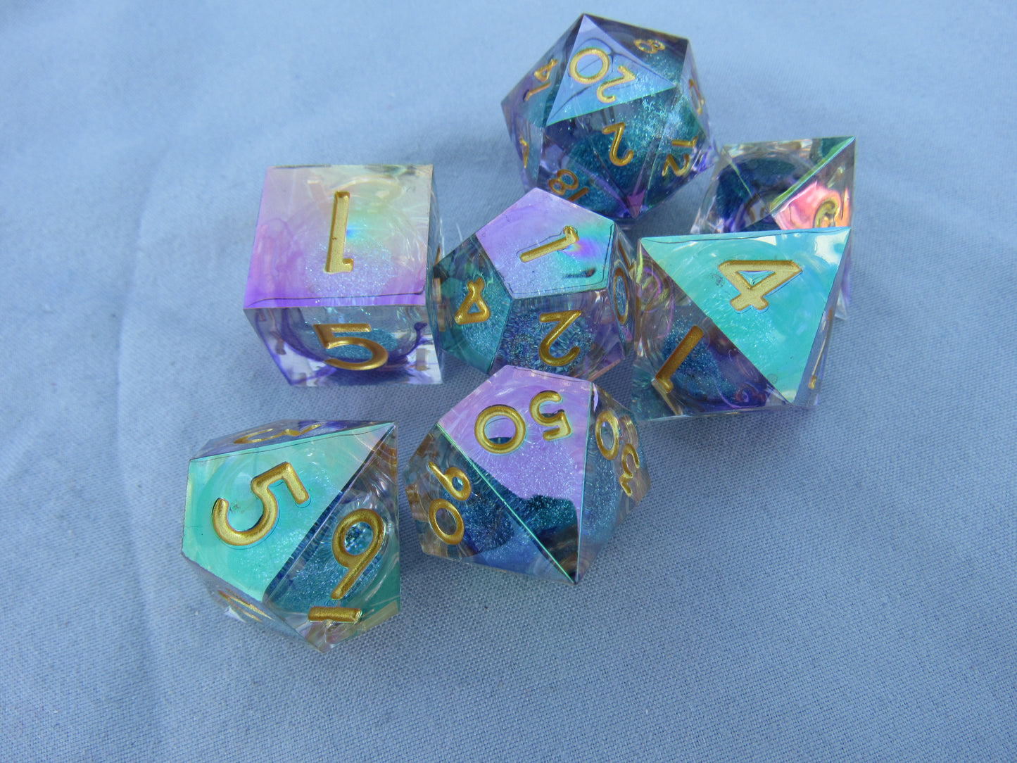 Light Teal and Purple Iridescent Liquid Core Sharp Resin Dice