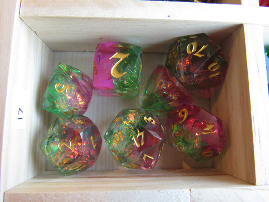 Set of colorful polyhedral dice with numbers in a wooden box gem gemstone cut faceted resin crystal dice