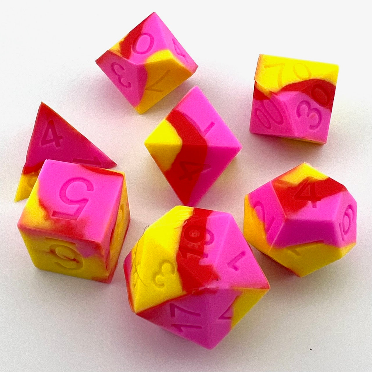 Yellow, Pink, and Red Silicone Dice