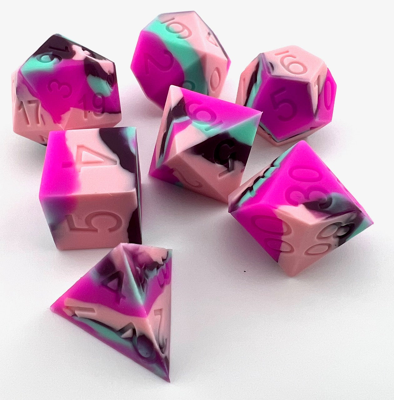 Pink, Rose, Teal, and Purple Silicone Dice