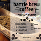 Battle Brew Coffee packaging with coffee grounds in a wooden scoop