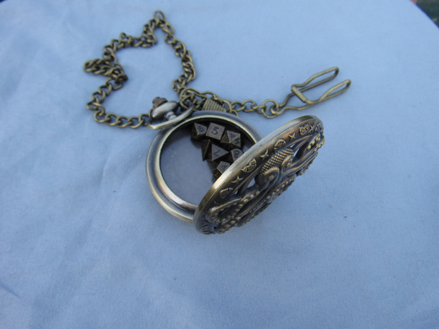 Tiny Dice in Antique Brass Octopus Pocket Watch Case