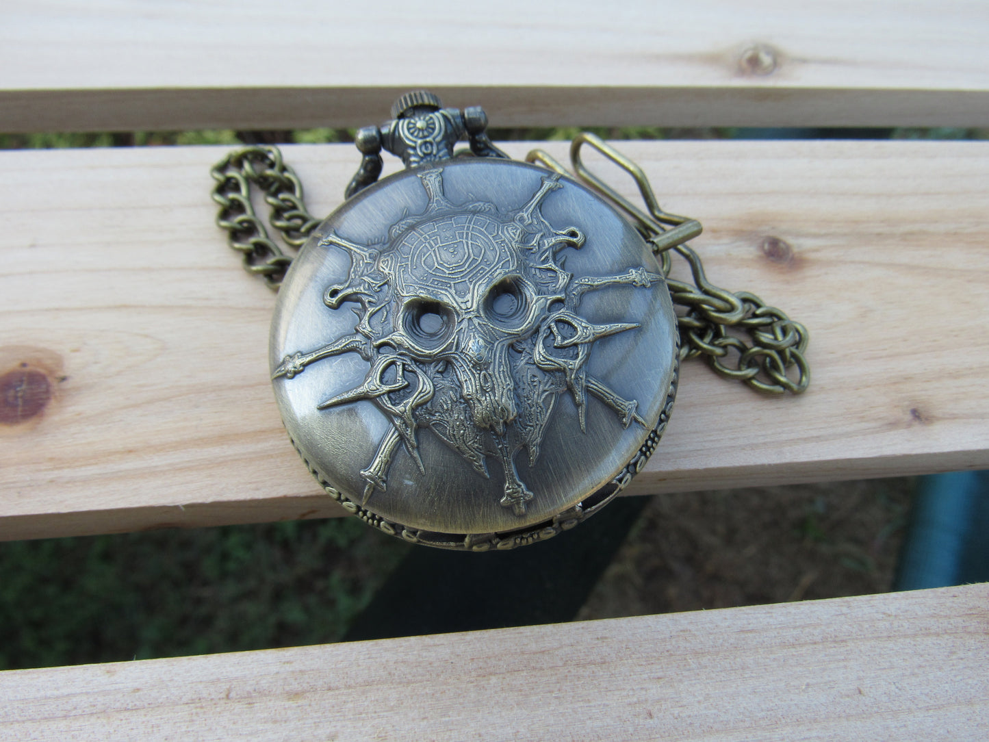 Tiny Dice in Skull Pocket Watch Case