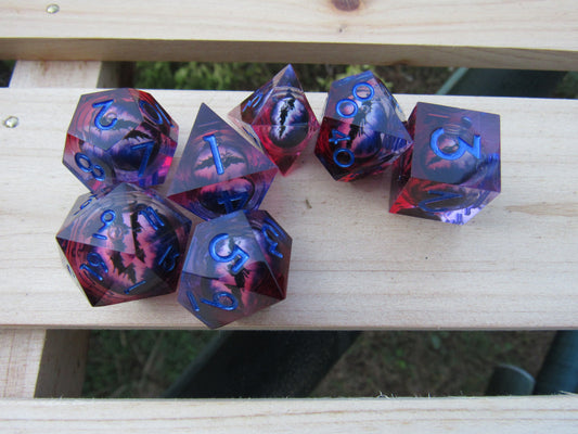 Red and Purple Eyeball Liquid Core Sharp Resin Dice