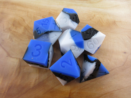 Blue, White, and Black Silicone Dice