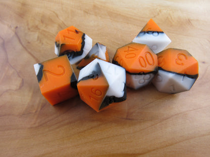 Orange, White, and Black Silicone Dice
