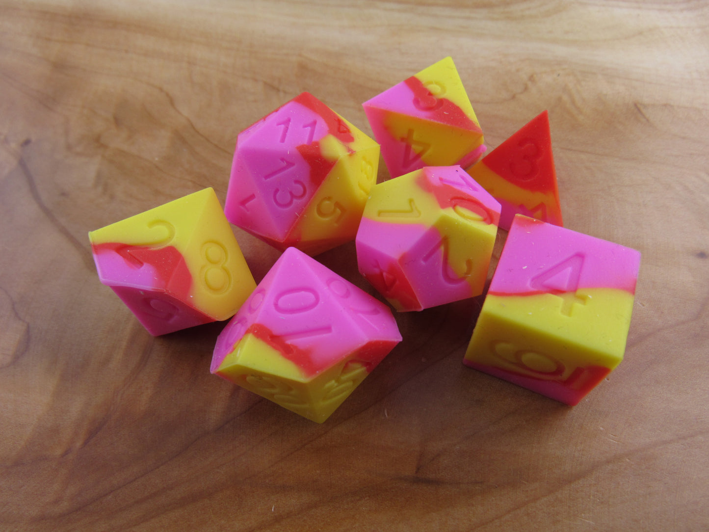 Yellow, Pink, and Red Silicone Dice