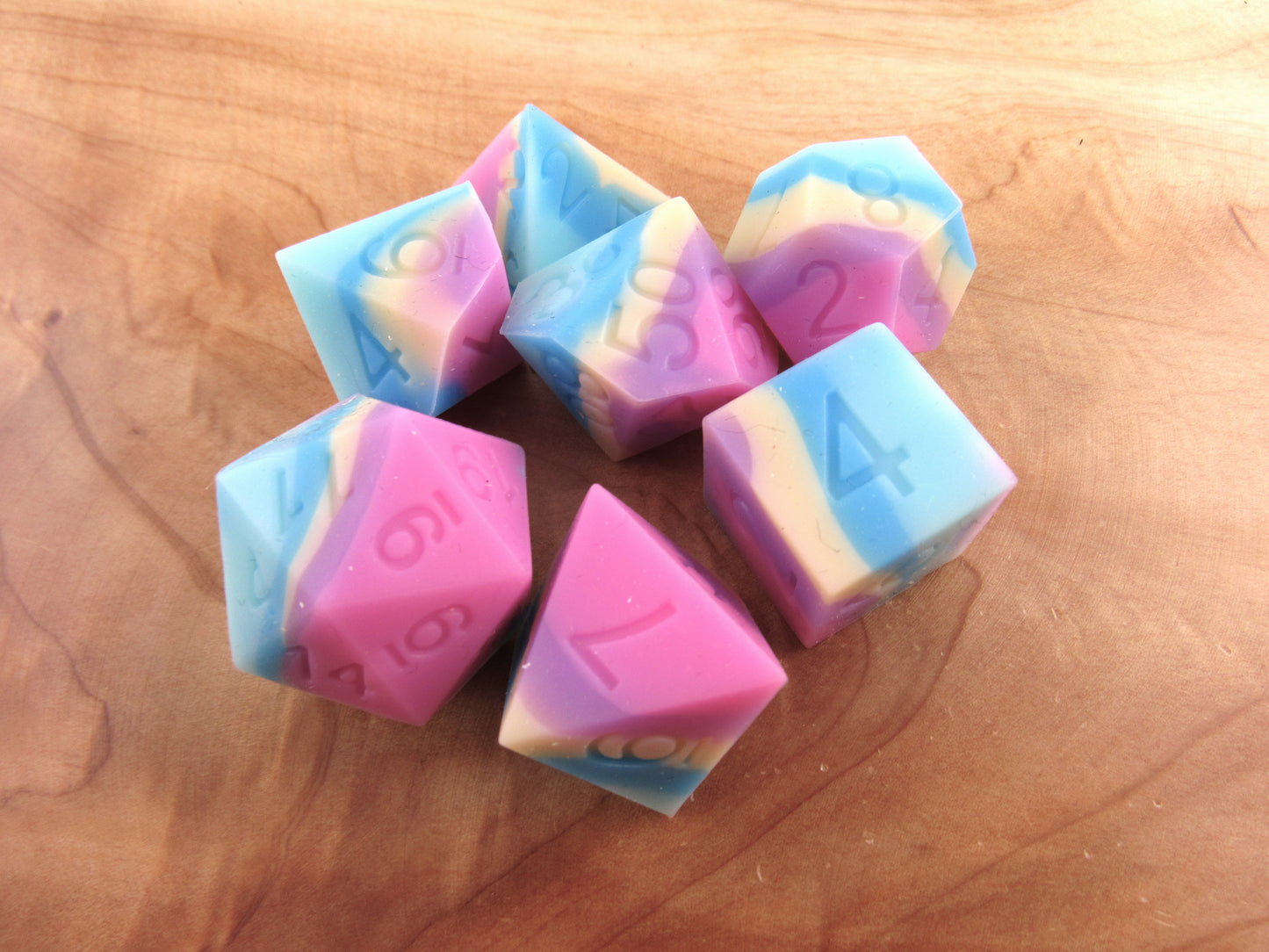 Pink, Yellow, and Blue Silicone Dice
