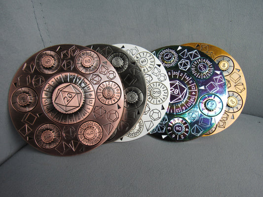 Set of five circular metal objects with embossed designs on a gray background dungeons and dragons spinner dice