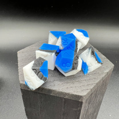 Blue, White, and Black Silicone Dice