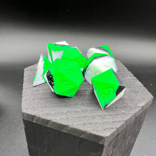 Green, White, and Black Silicone Dice