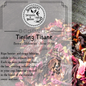 Tiefling Tisane packaging with tea leaves and brand logo on a textured background
